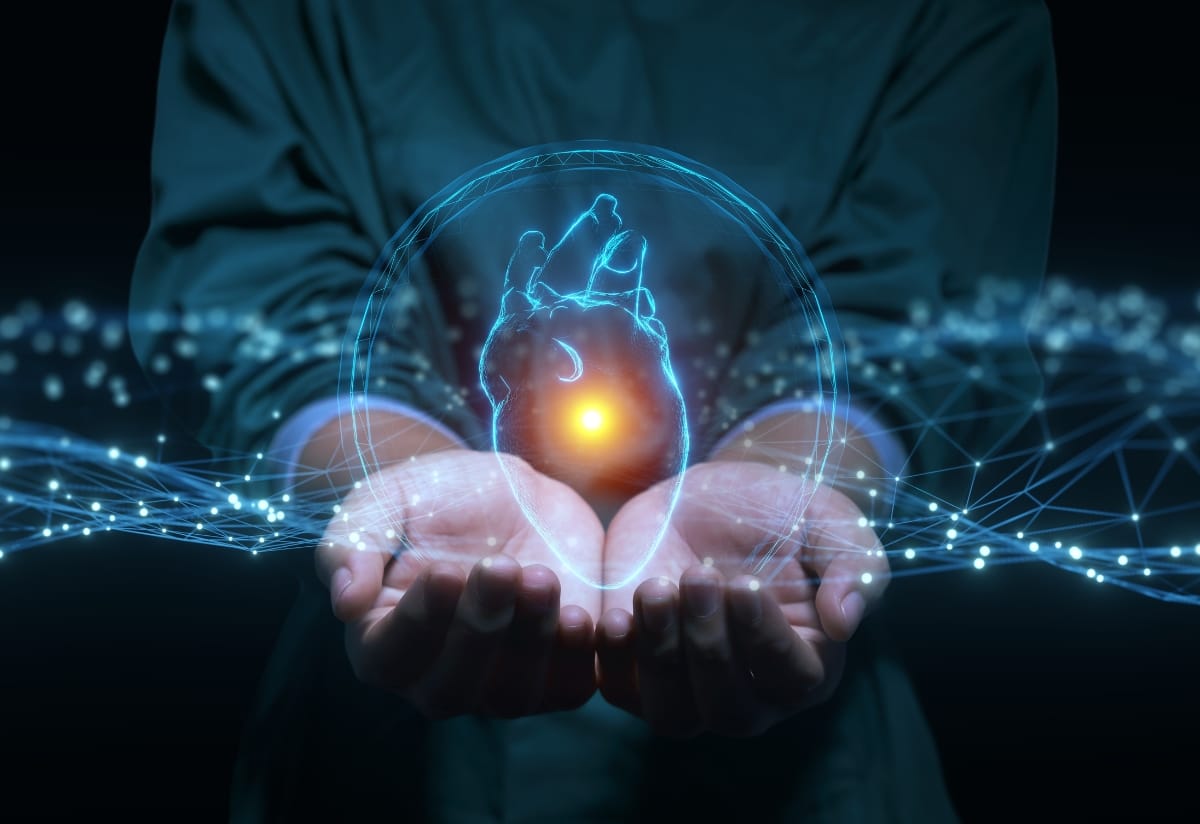 A stylised image of two hands holding a heart
